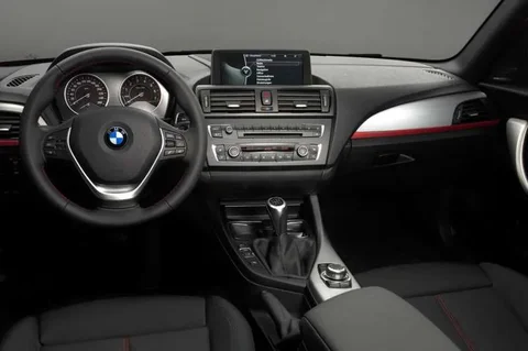 BMW 1-Series 114d High Executive 2013 view 2