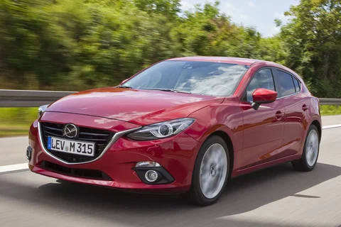 Mazda 3 SkyActiv-G 2.0 120 TS 2013 view 4
