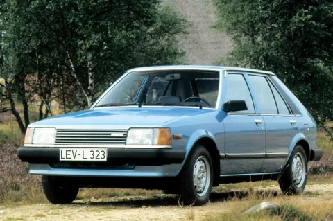Mazda 323 1.3 DX 1980 view 2