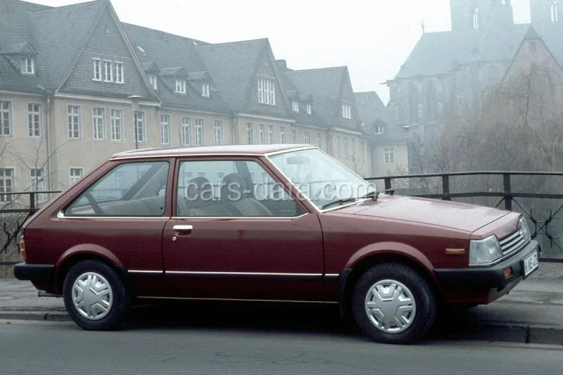 Mazda 323 1.1 DX 1982 front view